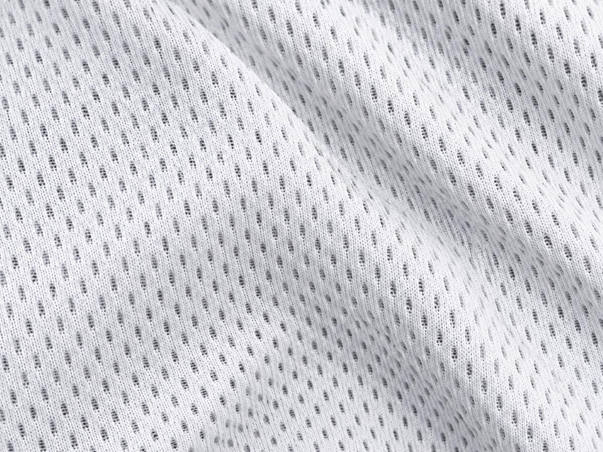 TLS Performance Air Mesh Toplevel Sportswear White Performance Air Mesh fabric showing breathable ventilation pattern