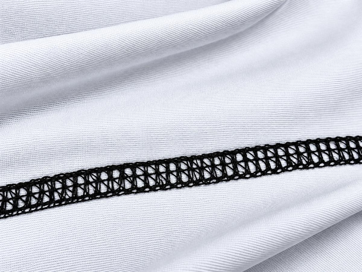 TLS Performance Jersey Stretch Toplevel Sportswear White Performance Jersey Stretch fabric with overlock seam detail
