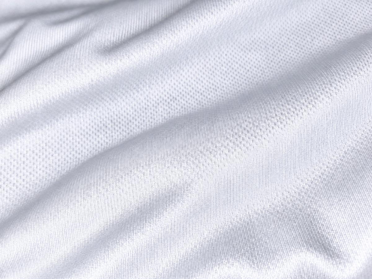 TLS Polyester Performance Micro Mesh Toplevel Sportswear White Polyester Performance Micro-Mesh fabric texture